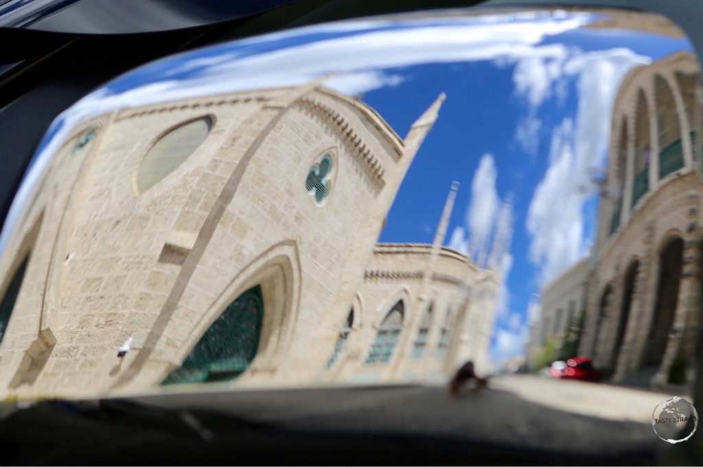 Reflection of coral-limestone buildings in Bridgetown.