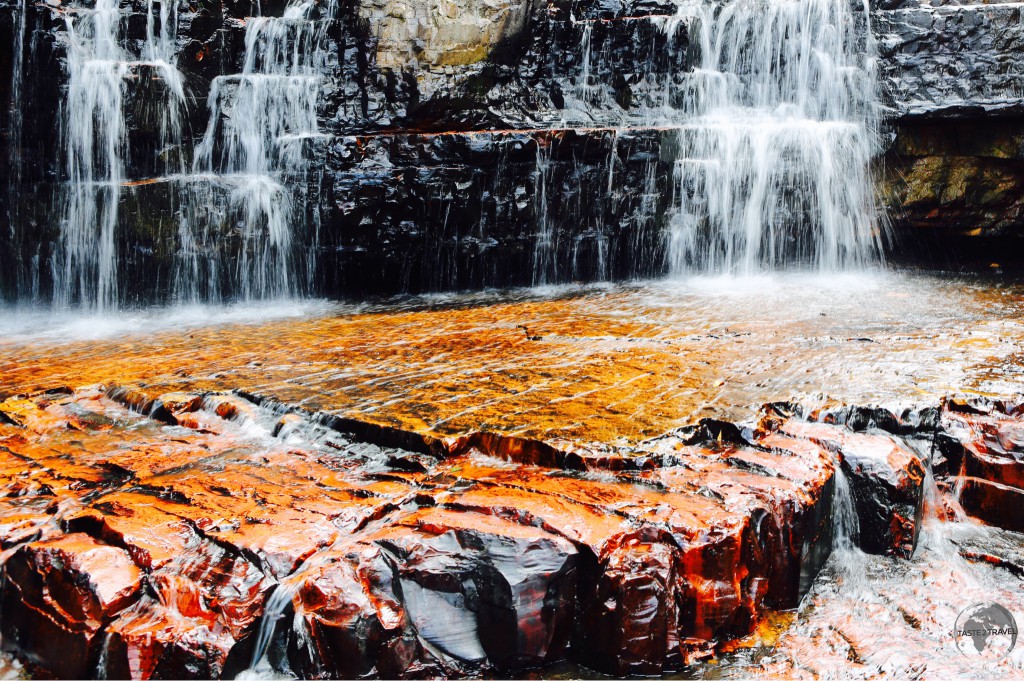 Jasper Creek Waterfalls, where the stone is as smooth and cool as polished marble.