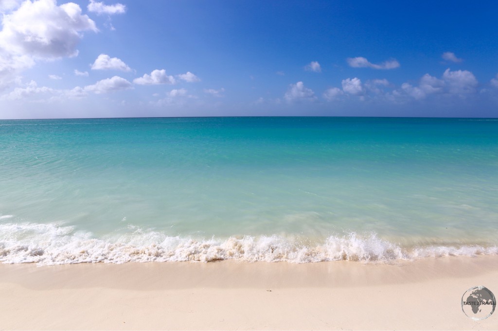The inviting turquoise waters of Palm beach are a key tourist draw.
