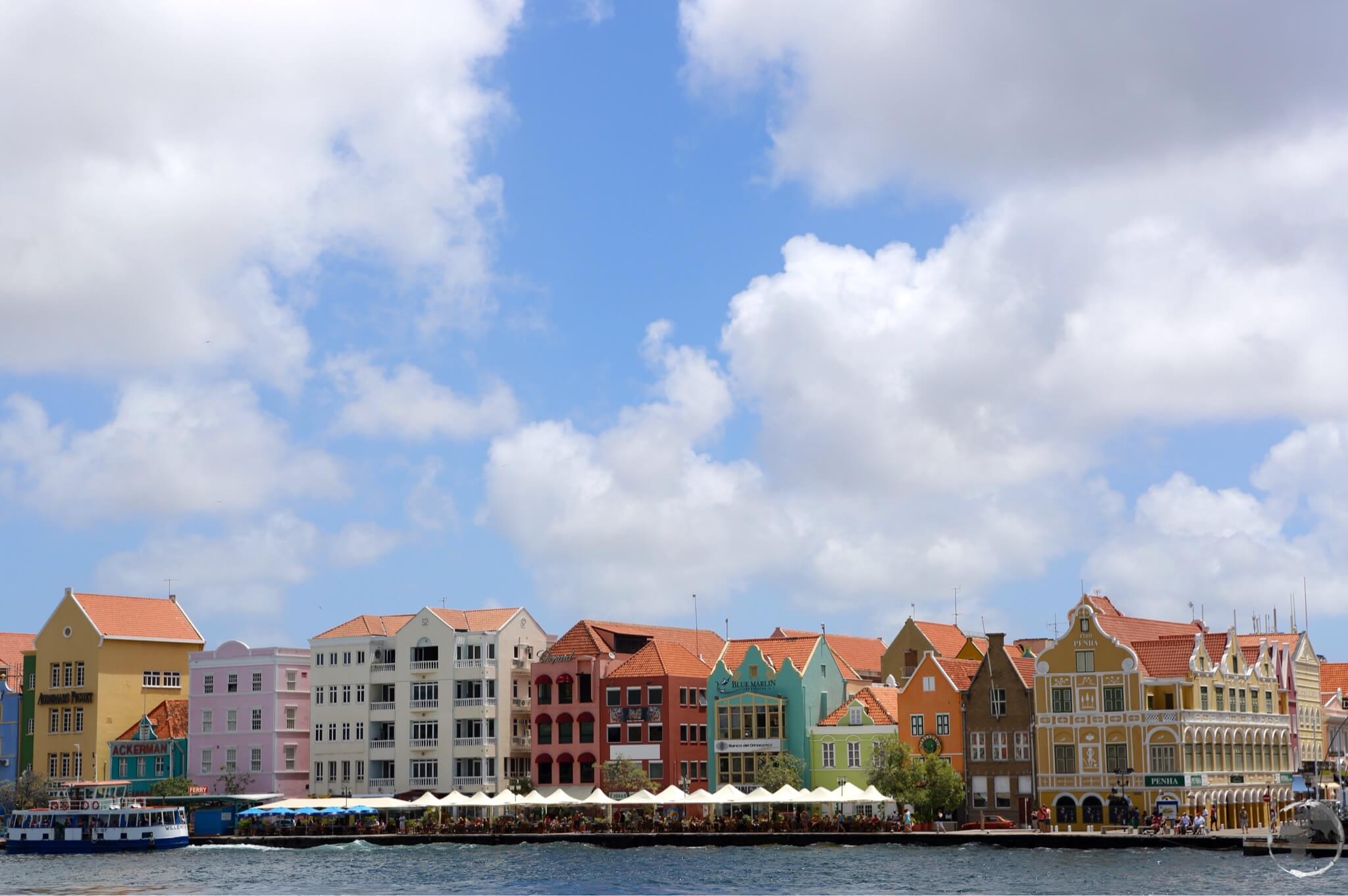 The houses which line the Handelskade form a colourful waterfront in Willemstad.