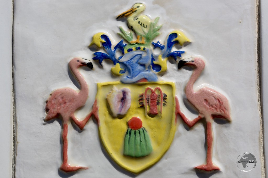 TCI coat of arms which features the Turks Head cactus.