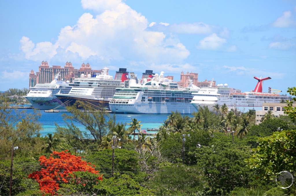 Cruise ships in Nassau harbour with Atlantis resort in the background.