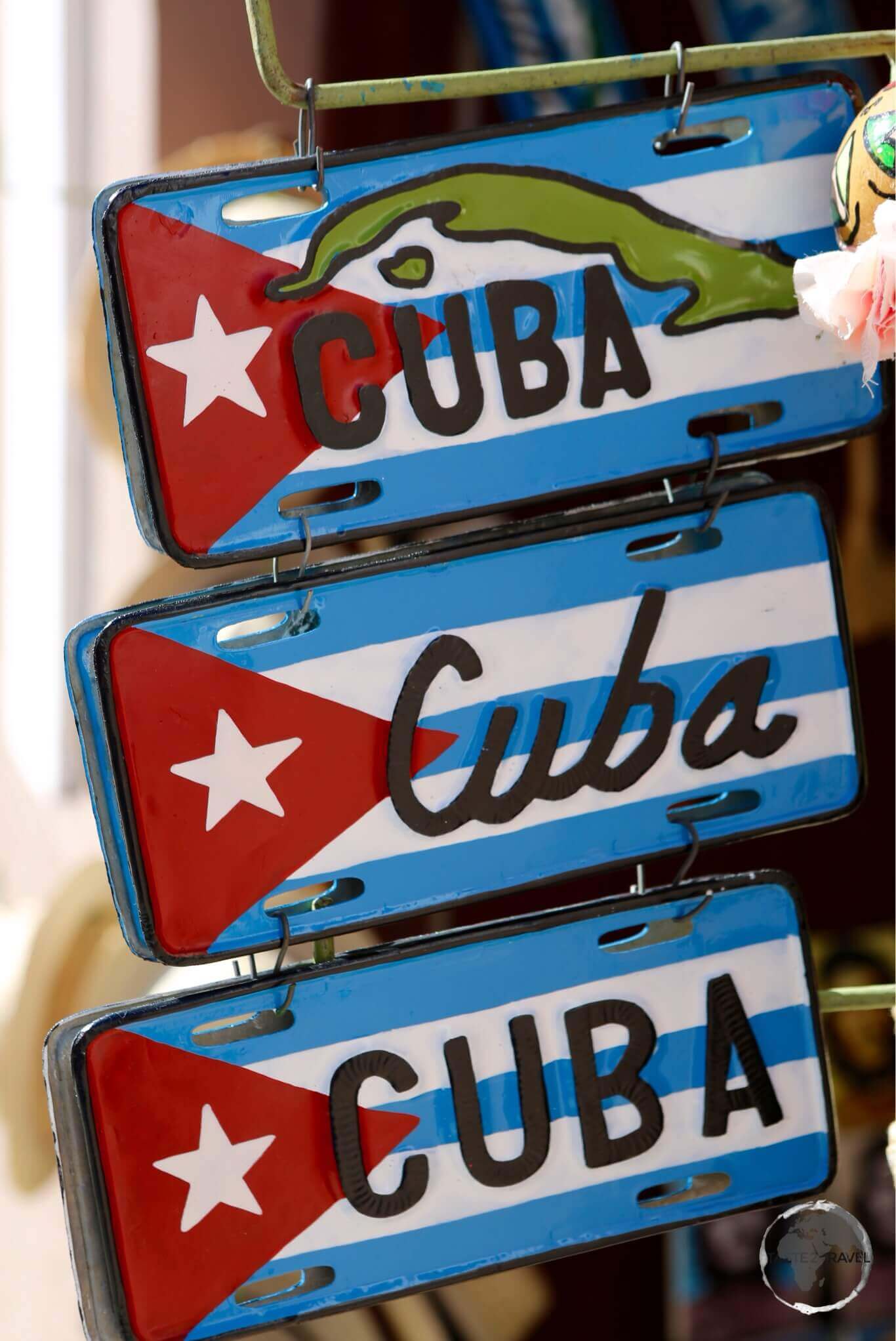 Souvenir Cuba flag license plates on sale in Havana old town.