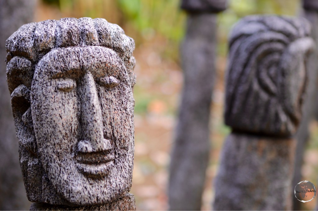 Traditional Kalinago busts carved from tree stumps.