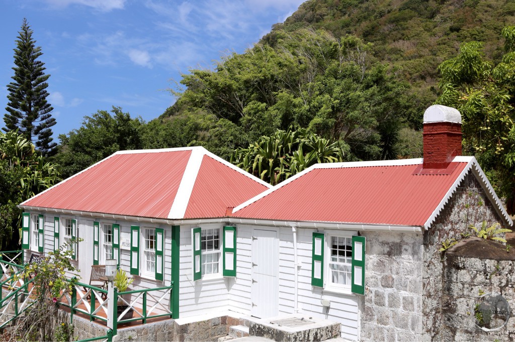 A strict building code on the island ensures all buildings are painted white, with green trim and red roofs.