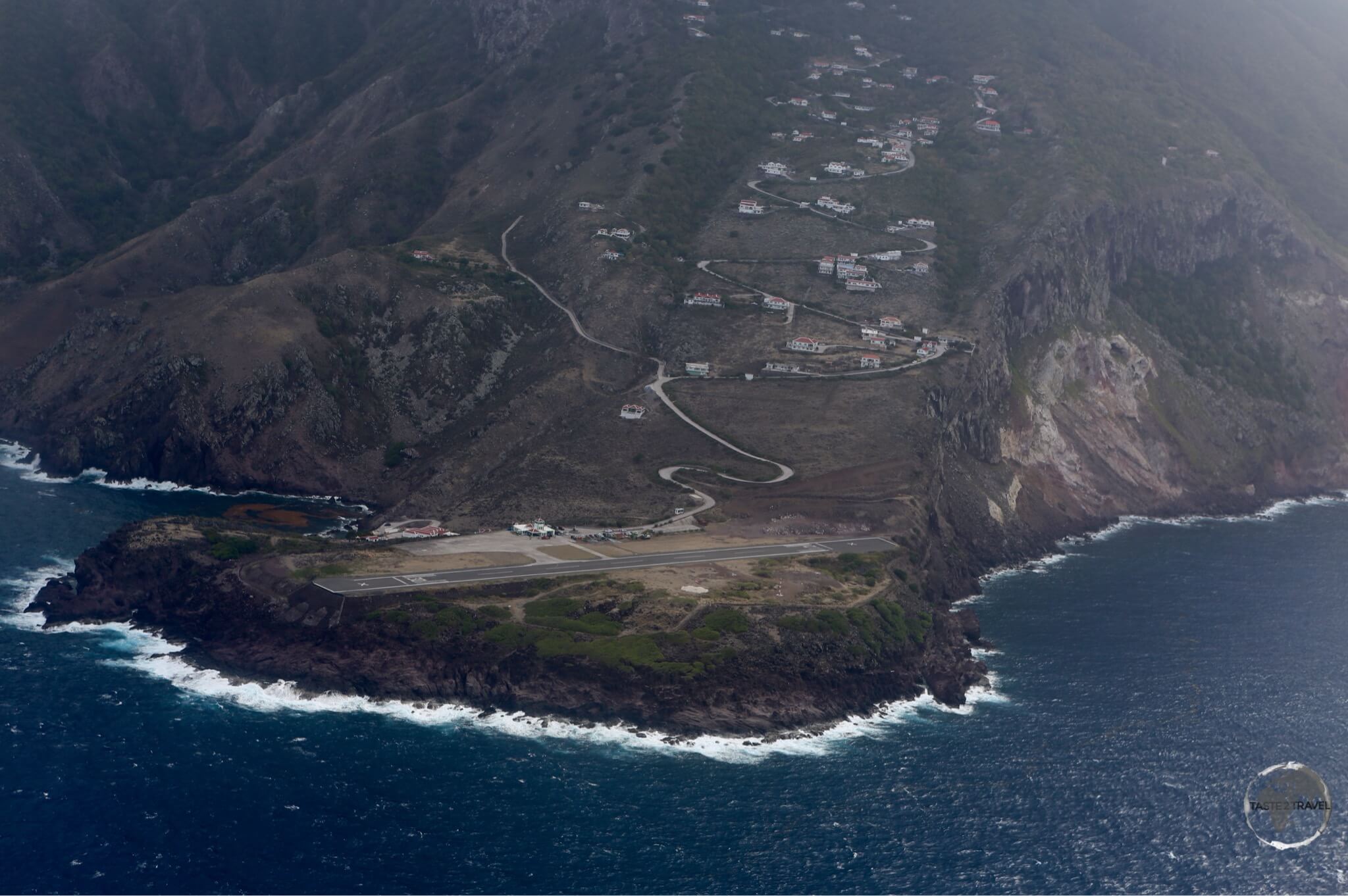 No room for pilot error at perilous Saba airport. "The Road" snakes its way from the airport across the island to Fort Bay.