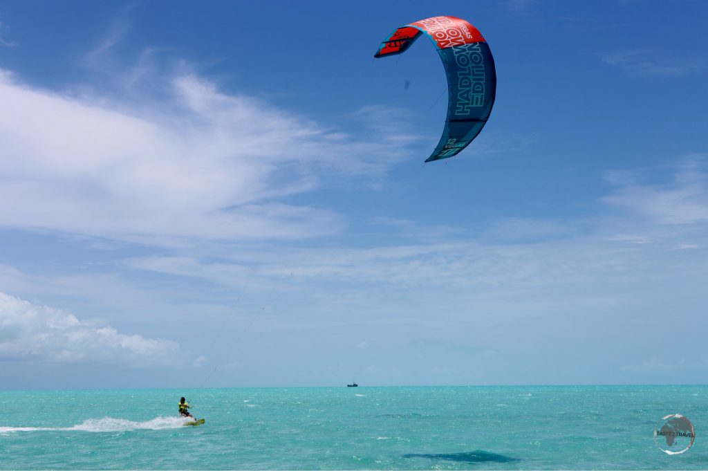 Kite-boarding is a popular activity on windy Long Bay.