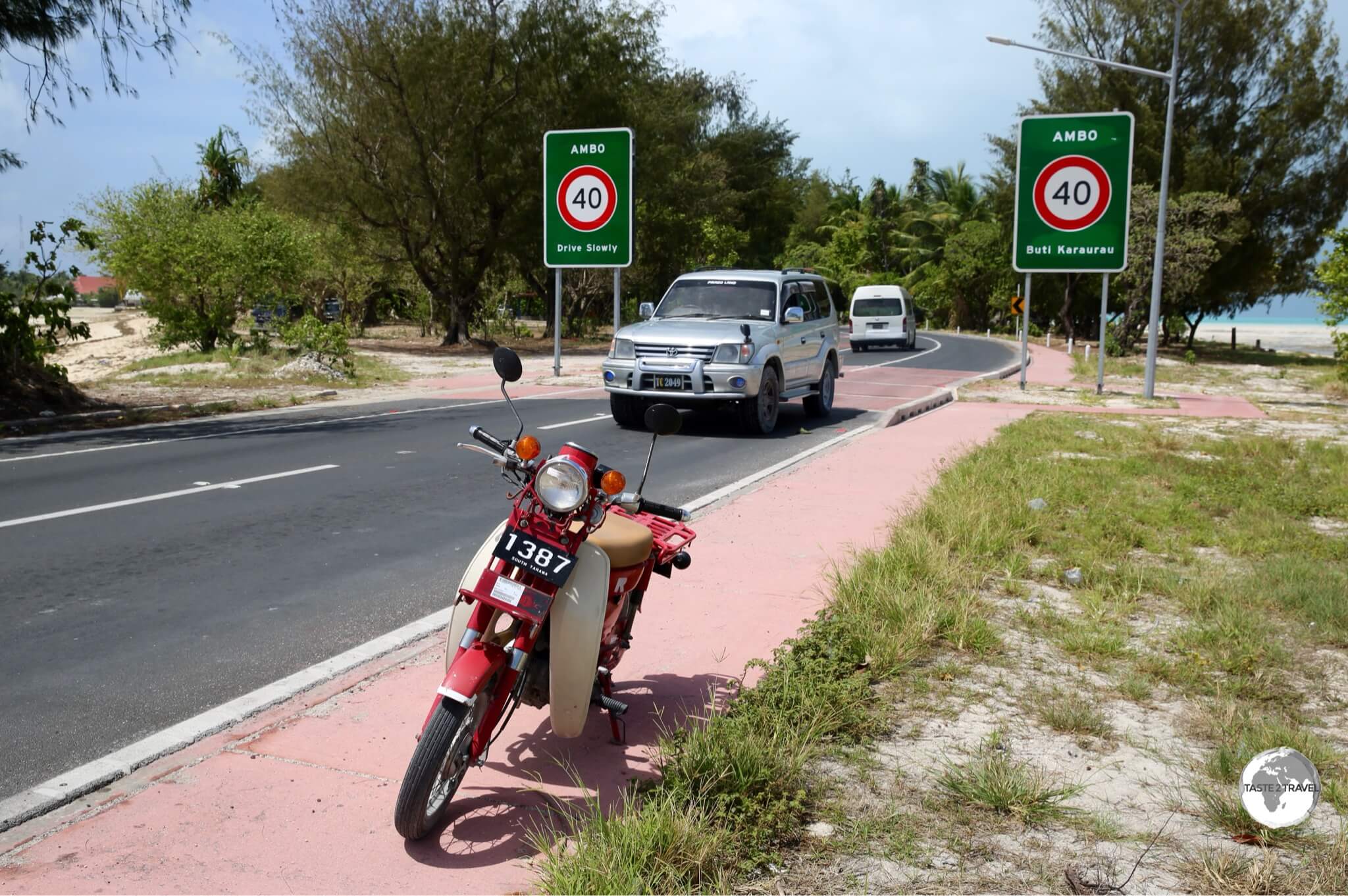 My rental scooter on the newly upgraded road on South Tarawa.