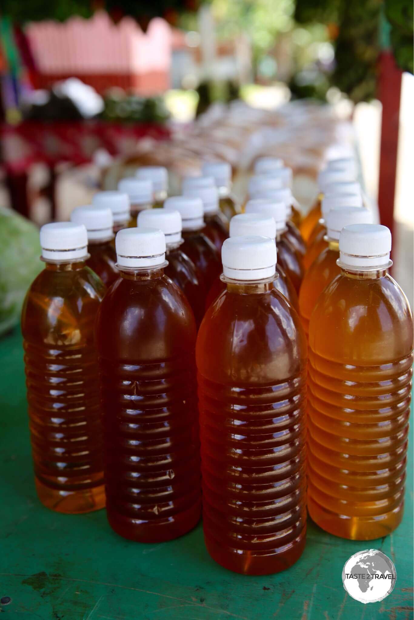 A bottle of locally made coconut oil costs US$2 in Weno.