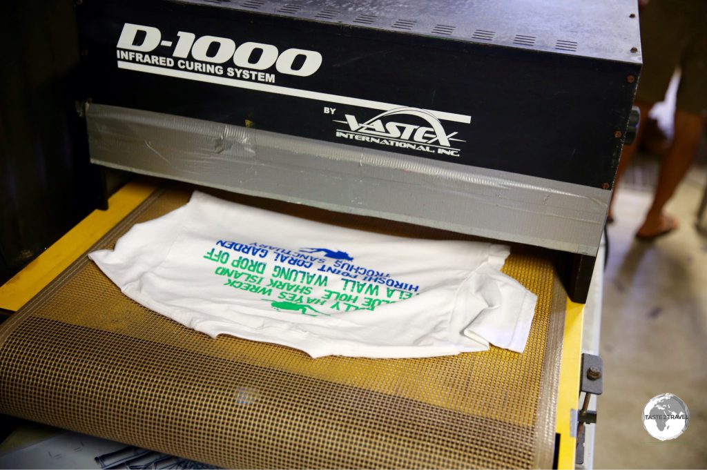 Designing shirts at the Green Banana Paper Company.