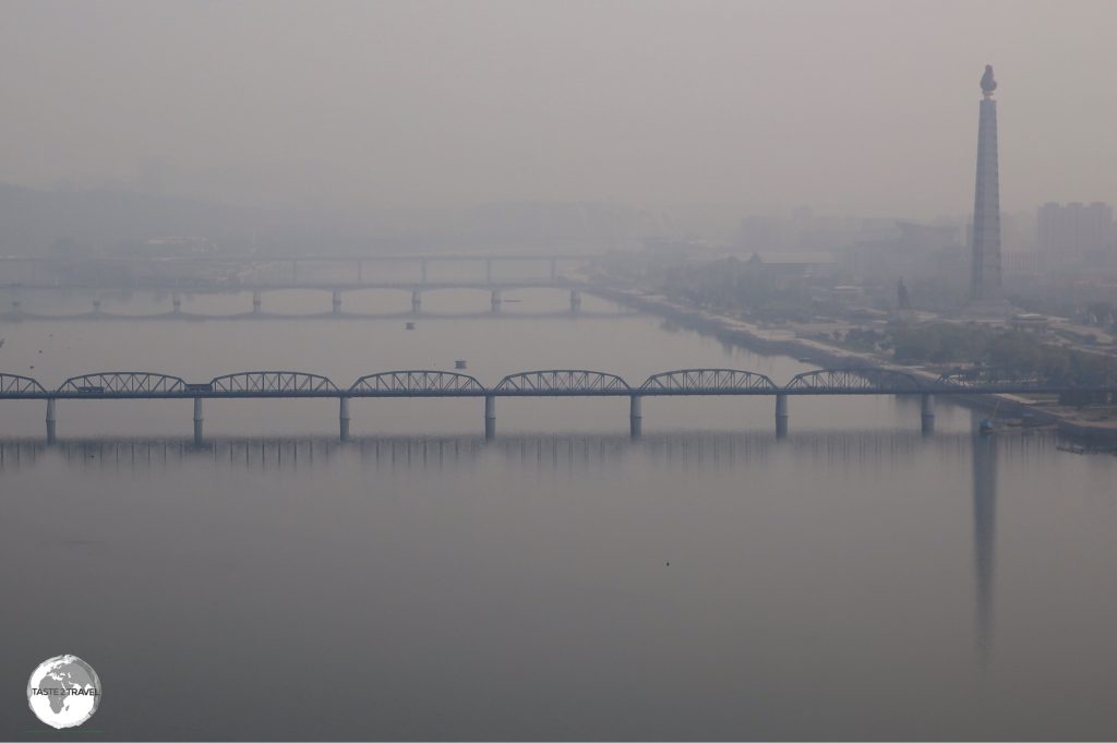 Early morning view of the Taedong River, which passes through downtown Pyongyang (Juche Tower can be seen on the right bank).