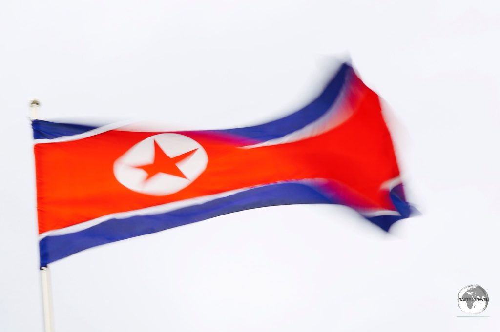 A DPRK flag flying outside the Science & Technology centre in Pyongyang.