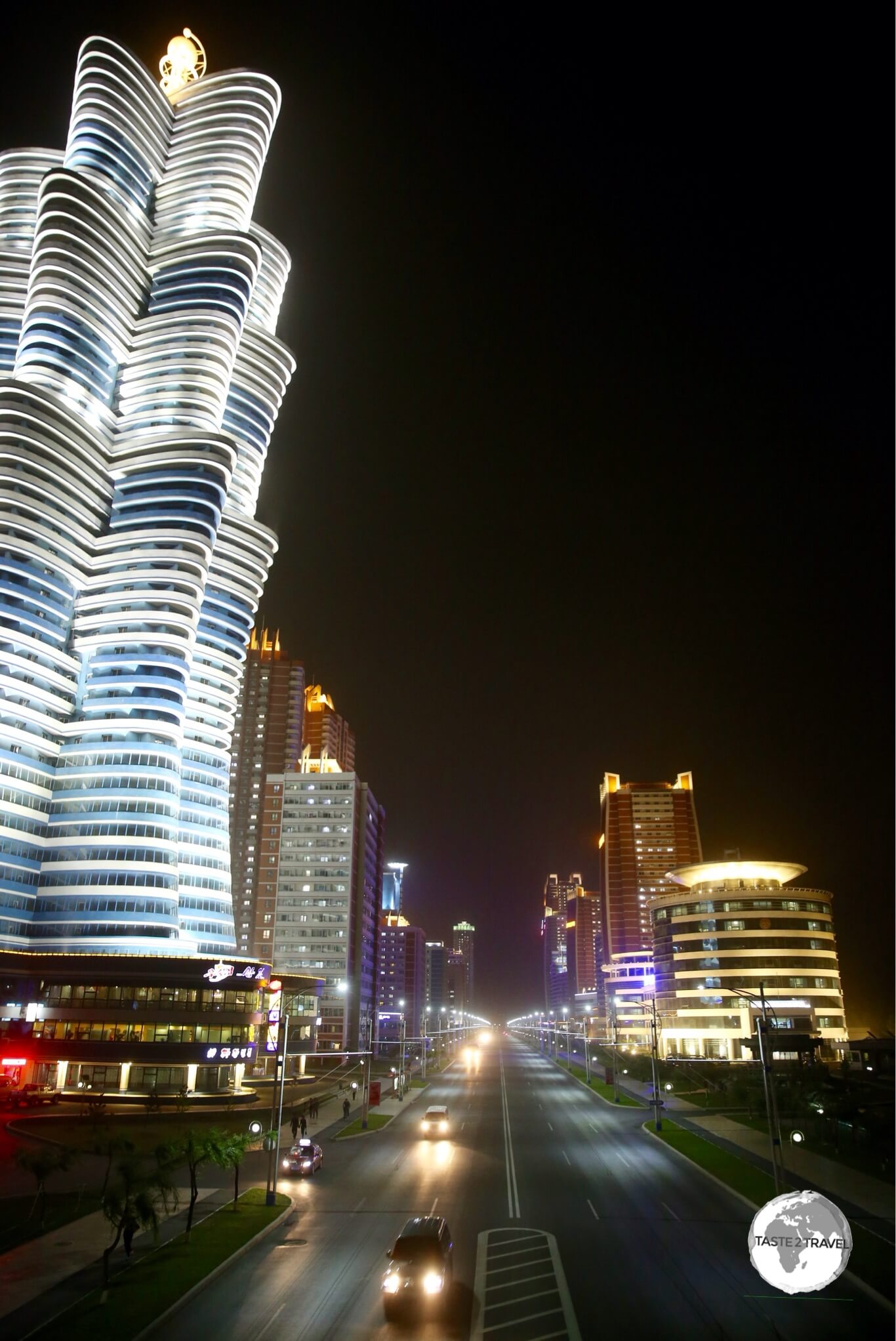 A night time view of Mirae Future Scientists street, a showcase neighbourhood in Pyongyang.