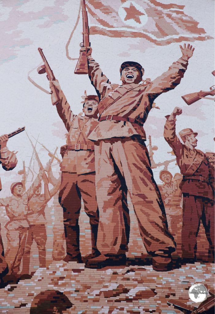 A giant tiled-mosaic depicting victory at the Victorious Fatherland Liberation War Museum.