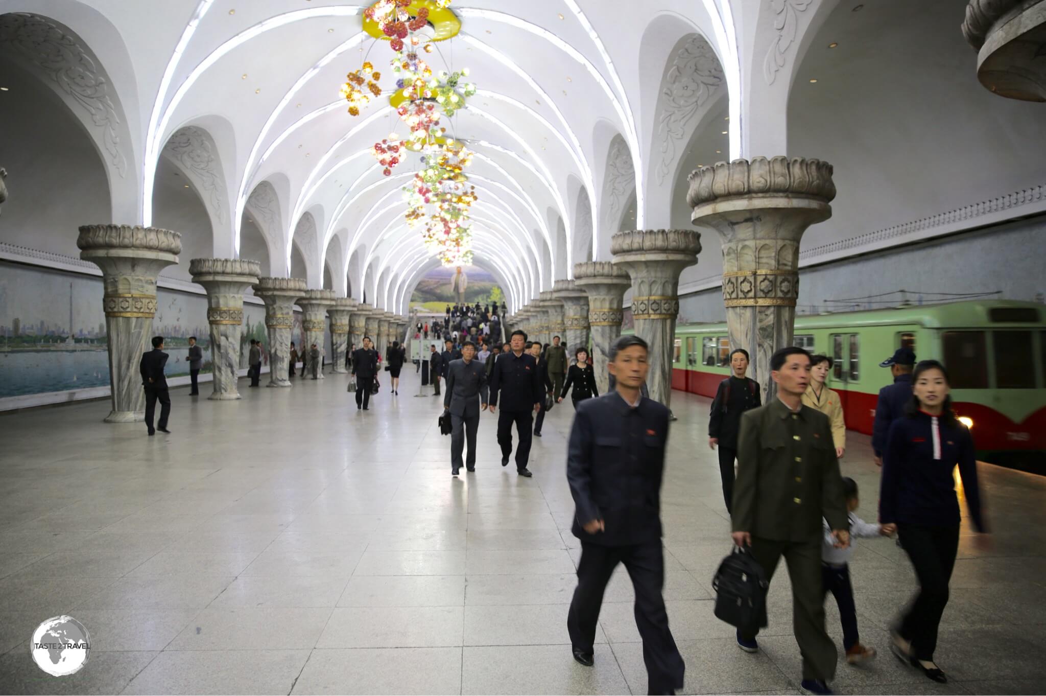 Ornate blown-glass chandeliers line the platform of Yonggwang station on the Pyongyang metro.