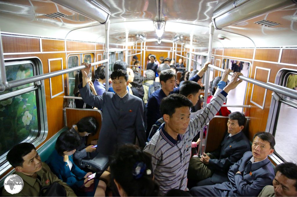 Riding the metro during the morning rush hour. The North Koreans were always keen to offer their seats.
