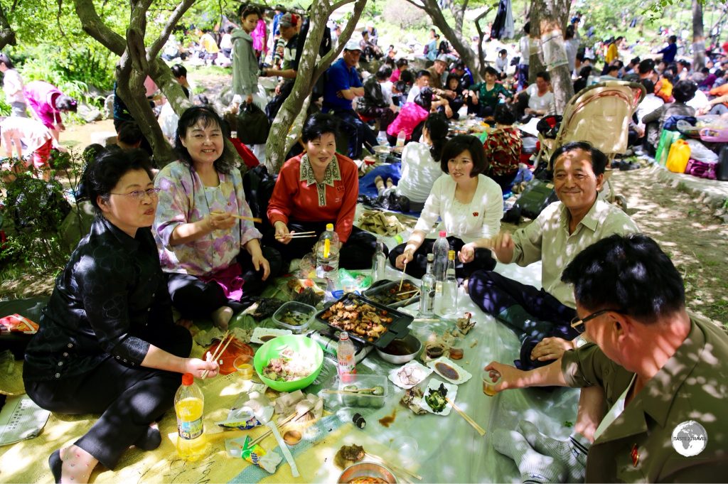 Moran Hill was impossibly crowded on May Day but the North Koreans were out to relax and enjoy celebrating their holiday. They're always keen to get tourists involved in their activities, whether it's dancing, karaoke or joining in their picnic.