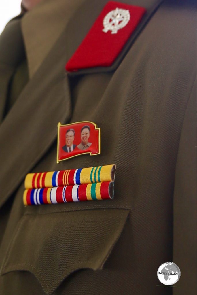 Once North Koreans ‘come of age’, they are required to always wear the party badge which features both the former leaders.