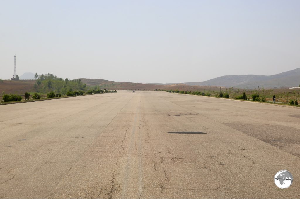 The wide, empty expressway to Nampo is typical of roads in North Korea where there are just 30,000 cars serving a population of 25,000,000.