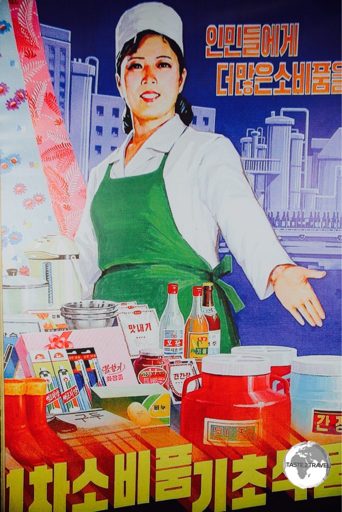 Propaganda poster at the Paeksonri Foodstuffs factory near Nampo.