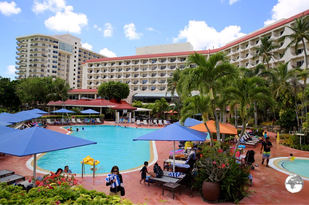 Most visitors to Guam stay in expensive resorts – such as the Hilton – on beautiful Tumon Bay.