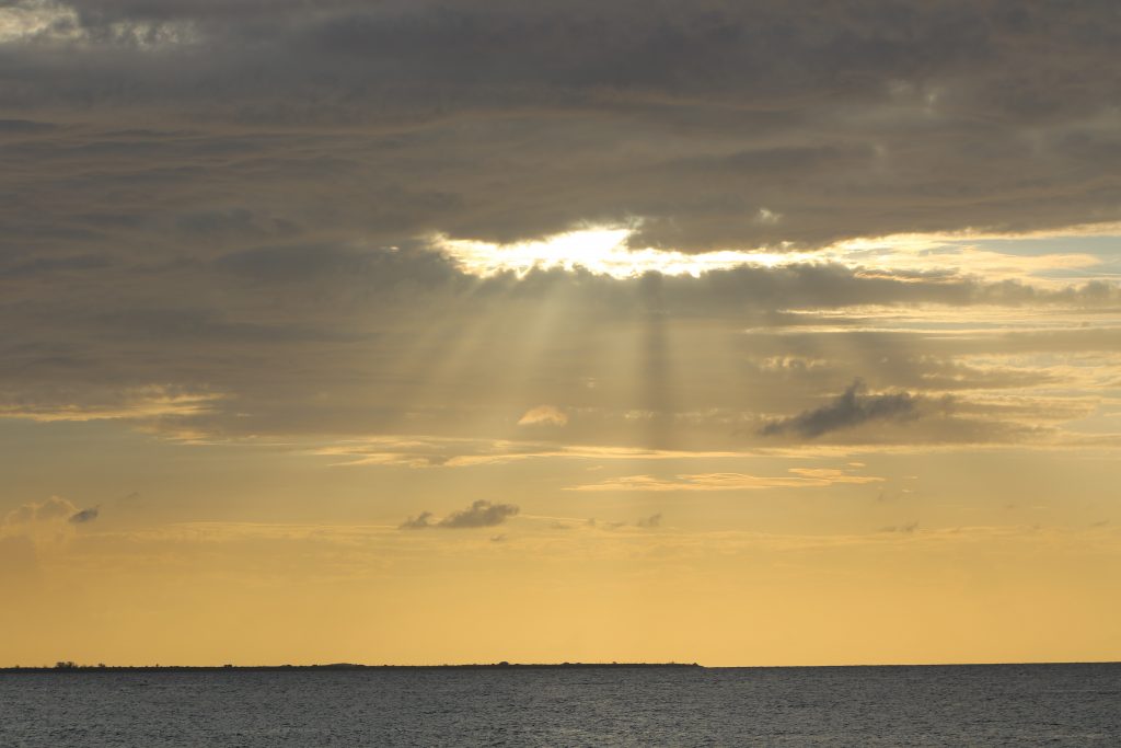 Sunset at West End Point, Cayman Brac – with Little Cayman in the distance.