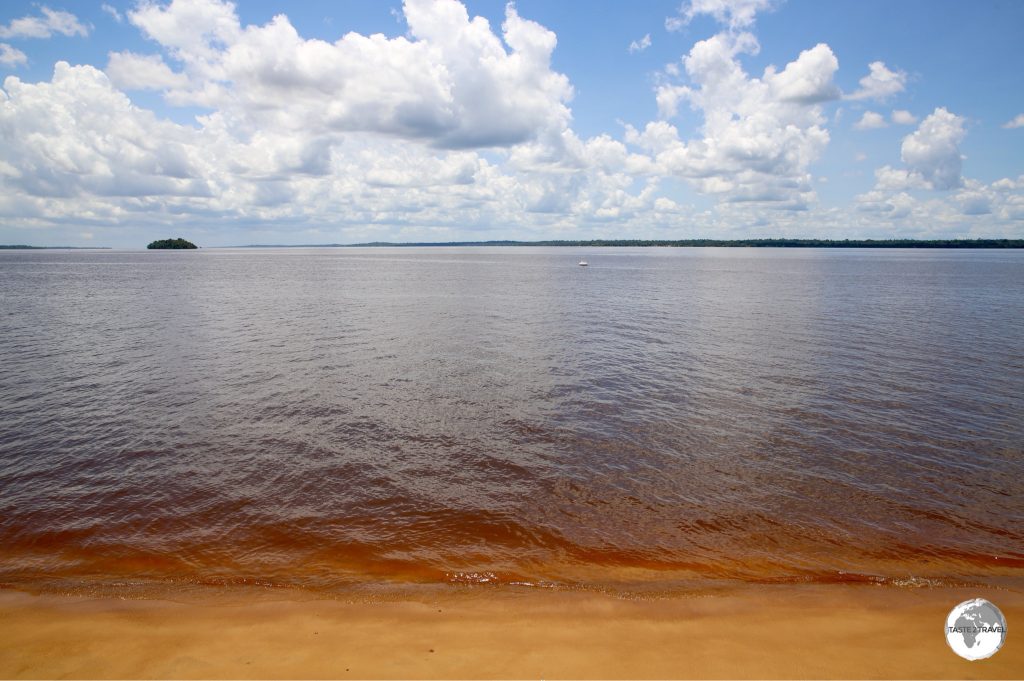 A red-earth beach on the Essequibo river in Bartica.