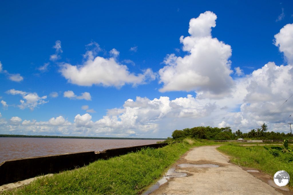 Traveling alongside the seawall of Wakenaam Island with the mighty Essequibo river on the left.