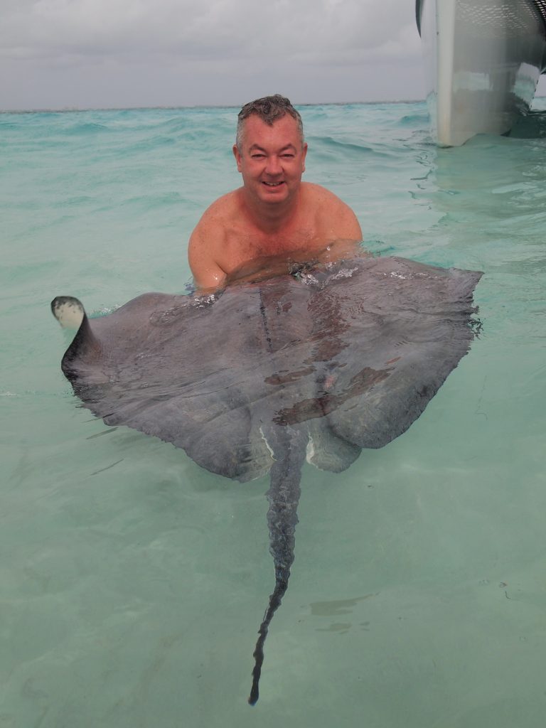 Getting friendly with a local at Stingray City.