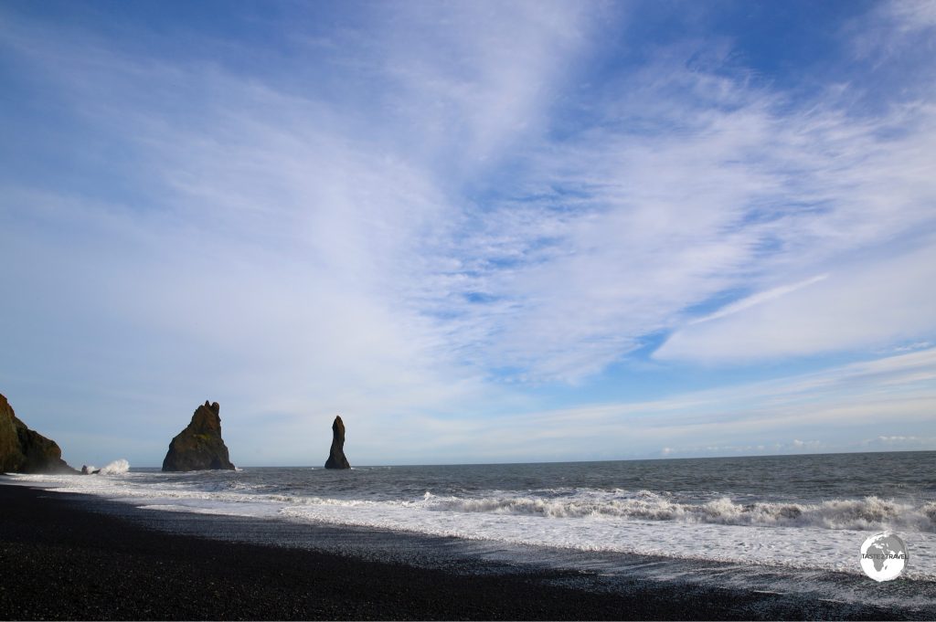 Reynisfjara (Black sand beach) with the two towering Reynisdrangar Trolls.
