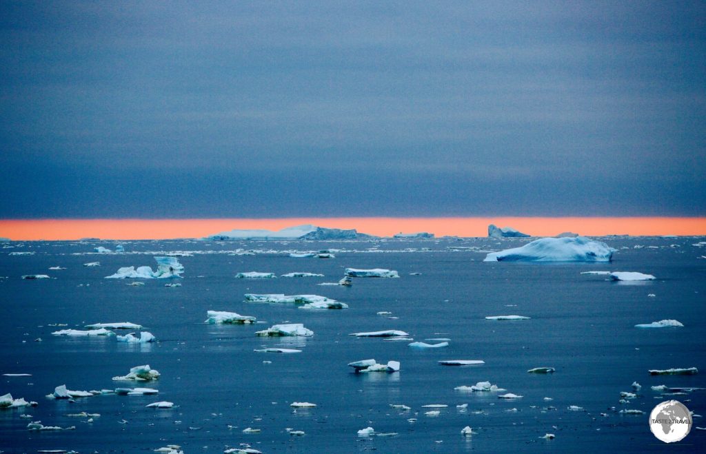 Now 11 pm and we are nearing the Antarctic Circle but ice floes and larger icebergs have created an obstacle course for our captain, slowing our progress.