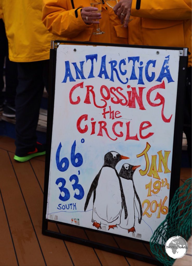 A cause for celebration - few travelers get to cross the Antarctic circle.