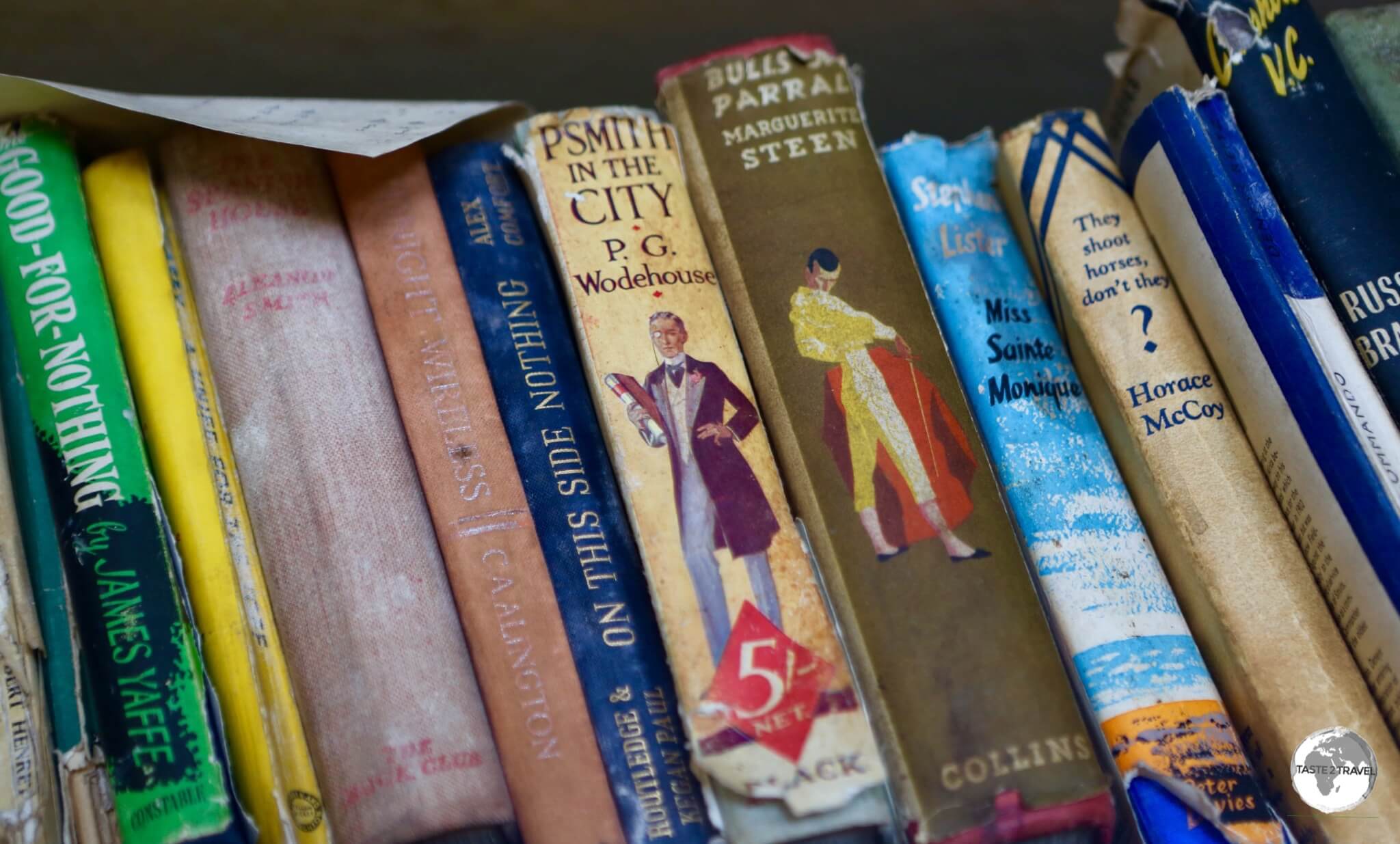 Books remain on the shelf at <i>Base W</i> on Detaille Island.
