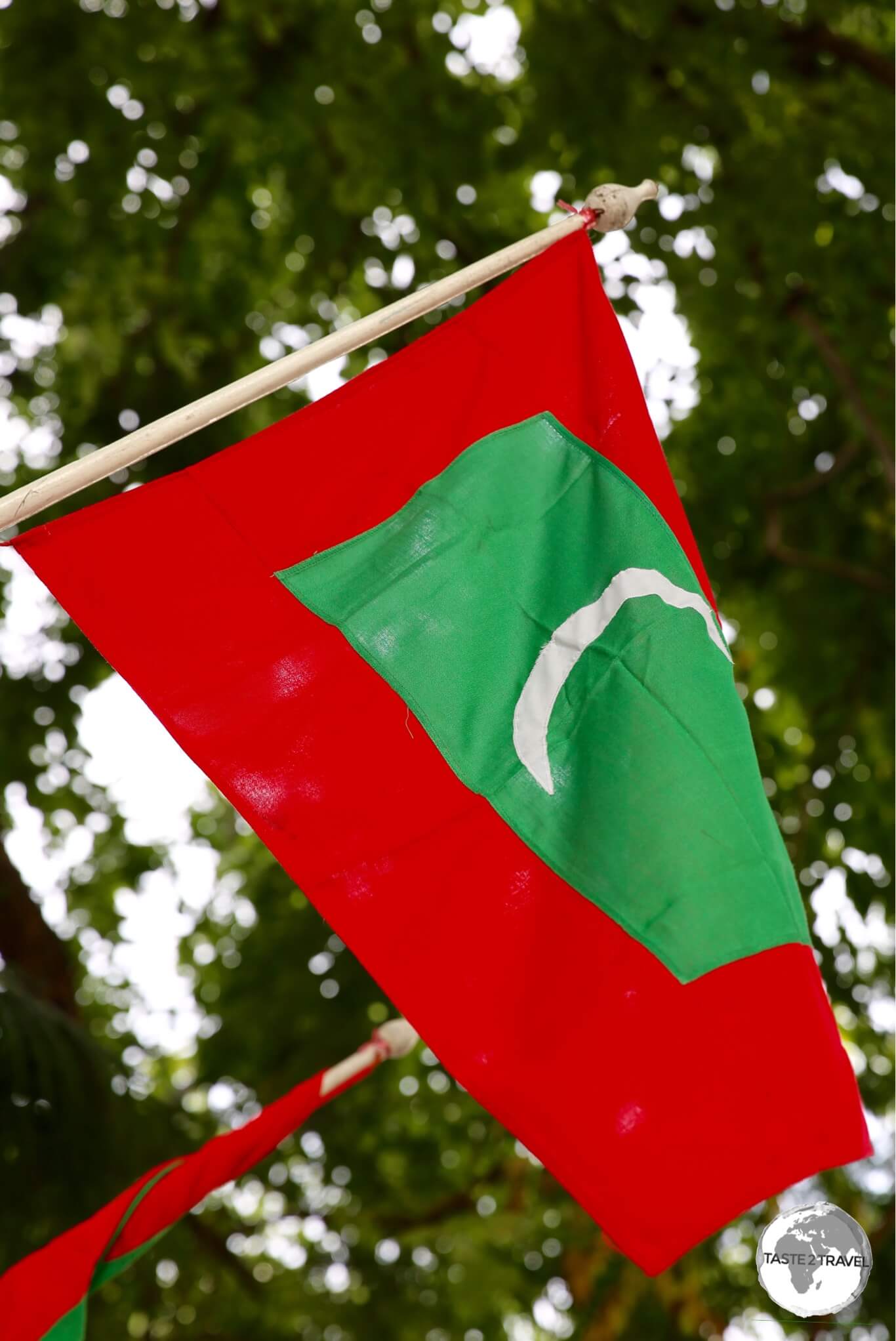 The flag of the Maldives flying in Malé.