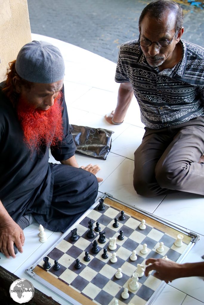 Chess is a popular game in the café's of Malé.
