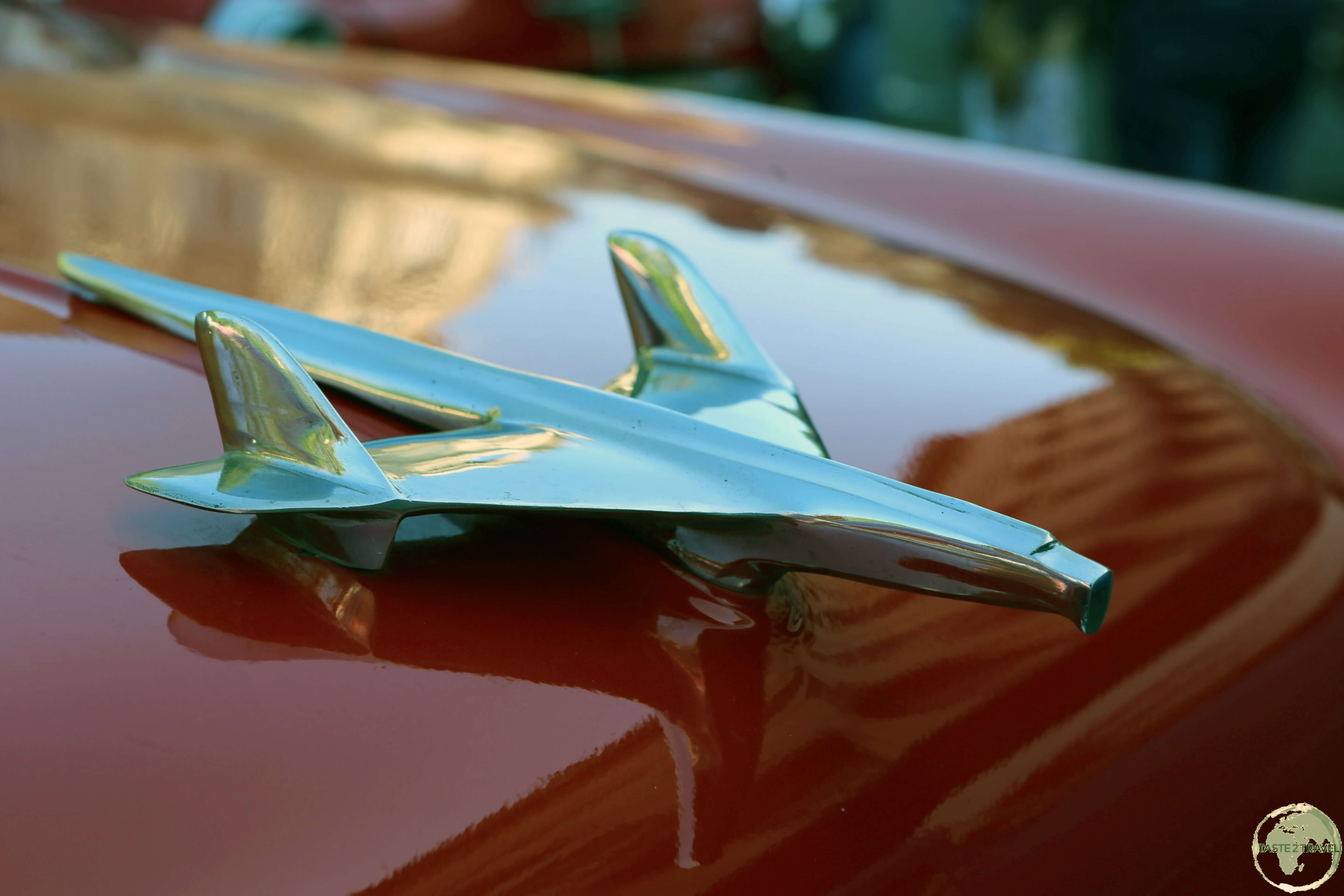 A hood ornament on a classic American car in Havana old town.