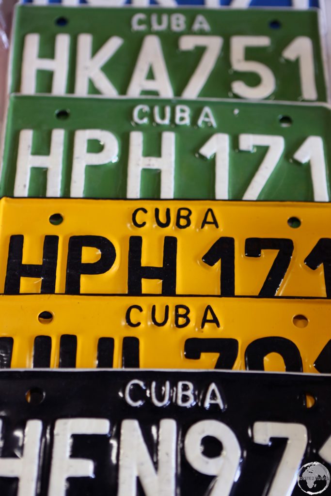 Old Cuban License plates make for popular souvenirs.