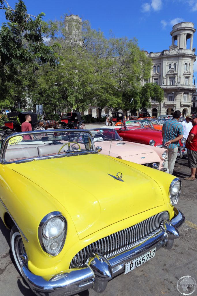 American classic car taxi's available for hire at Central Park.