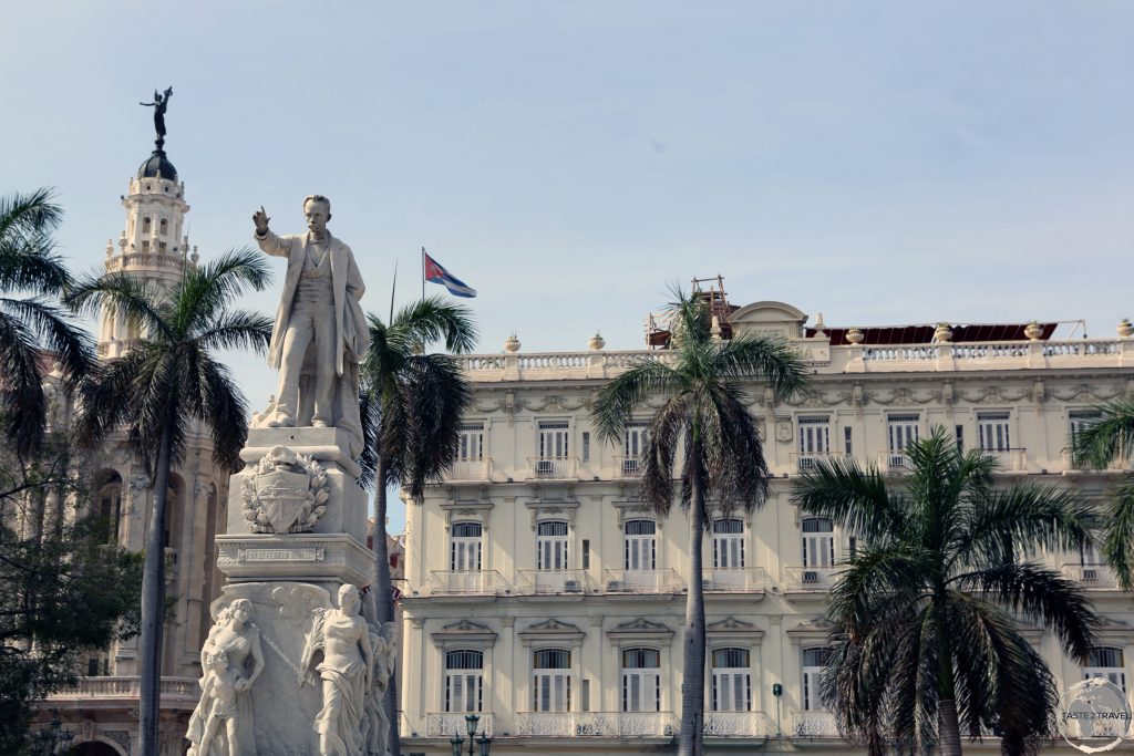 A statue of José Martí in Central Park (Hotel Inglaterra is in the background).