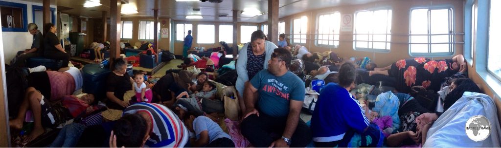 The slow car ferry can get very crowded with the Tongans preferring to lay on their mats on the floor.