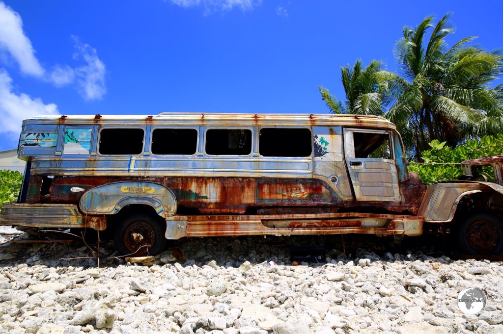 An abandoned Filipino Jeepney lies on the beach on Funafuti - a long way from home.