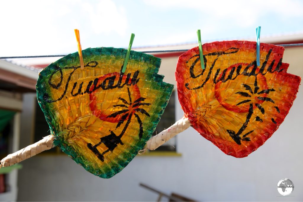Painted, hand-woven Tuvaluan fans make for nice souvenirs.