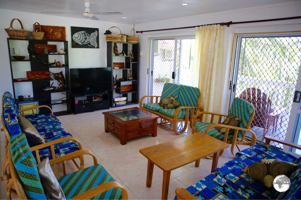 The comfortable living room at L's Lodge which includes satellite TV.