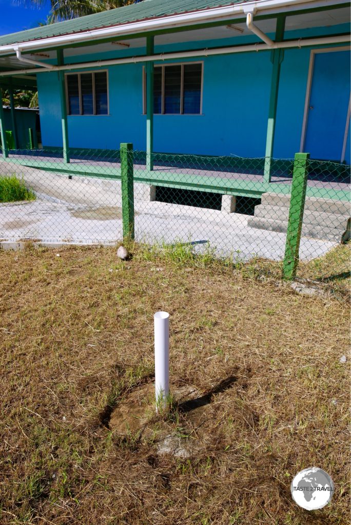 A white PVC pipe marks the bore-hole from David's Drill.