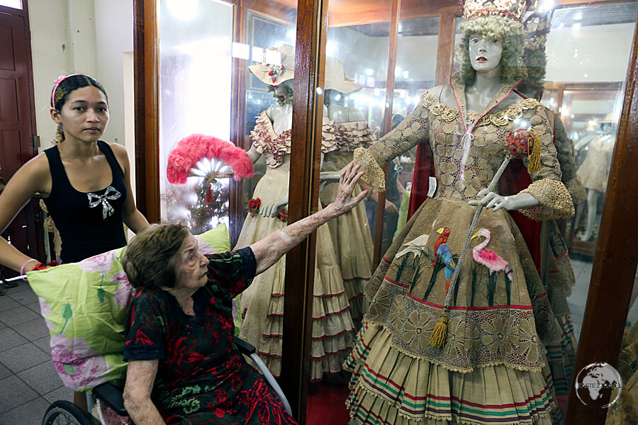 Dica Frazão, who sadly passed away in 2017, providing me with a personal tour of her unique collection of costumes, all of which were made by her from local natural fibres.