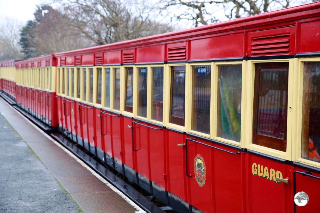 The distinctly red carriages of the Steam Railway Company.