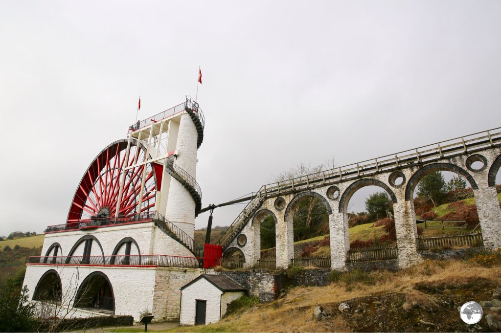 The Laxey Wheel (also known as Lady Isabella) is built into the hillside above the village of Laxey in the Isle of Man. It is the largest working waterwheel in the world.