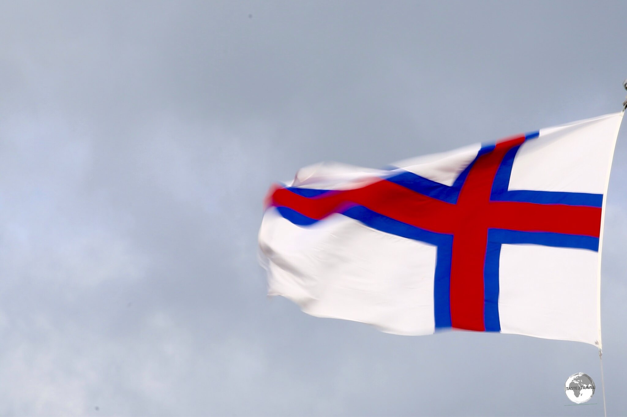 The Faroe Islands flag flying in downtown Tórshavn.