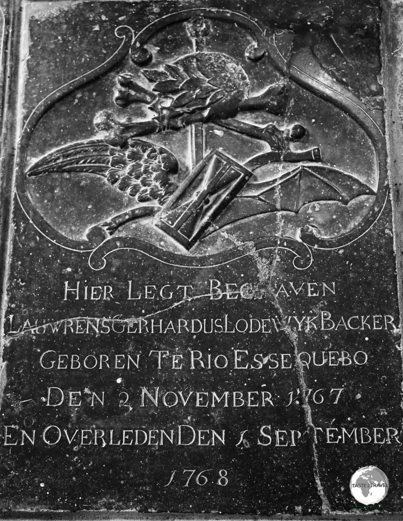 The tombstone of Laurens Backer which is embedded in the floor of the 'Court of Policy' building.
