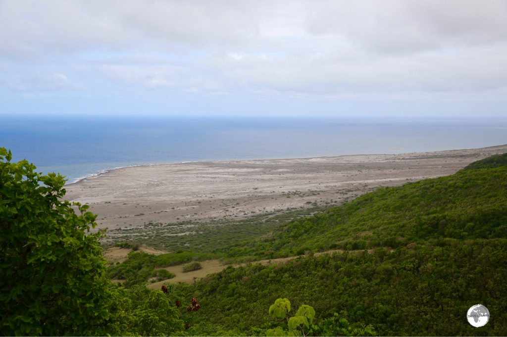 A view into the exclusion zone from the Jack Roy Hill lookout. The old airport, W. H. Bramble, lies buried in the rubble below.